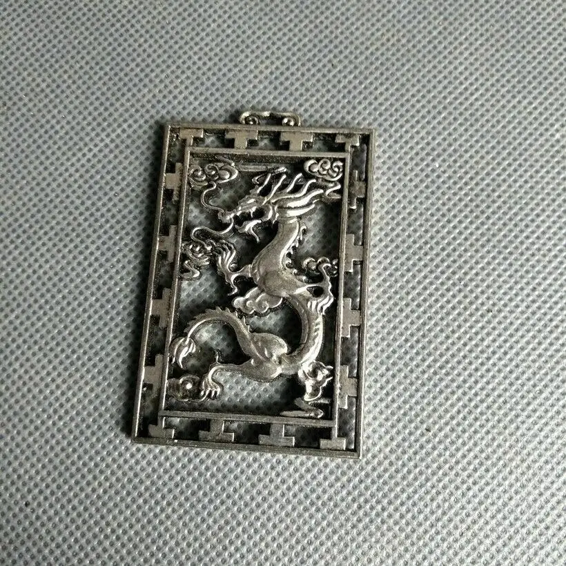 

Chinese Old Tibet Silver Hand Carved Dragon Pendant