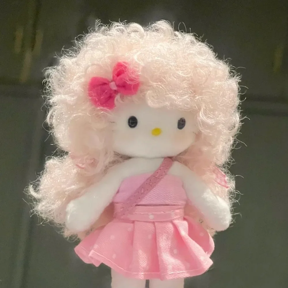 Echte Hello Kitty Eluches Miniso süße coole explosive Kopf lange Bein Rucksack Anhänger Mädchen süße lockige Haare Mädchen Plüschtier