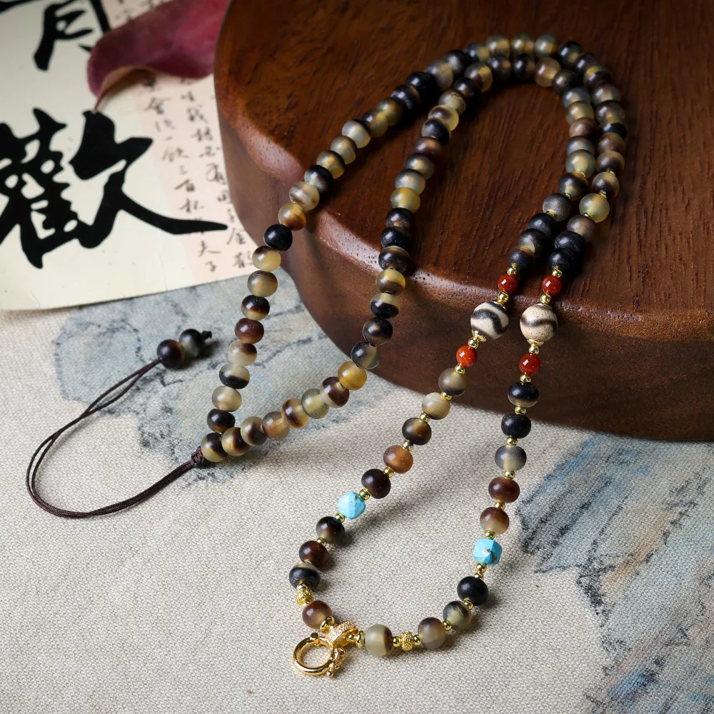 

Hand-woven black ram's horn tiger's tooth dzi universal pendant rope cultural toys ethnic style lanyard jewellery