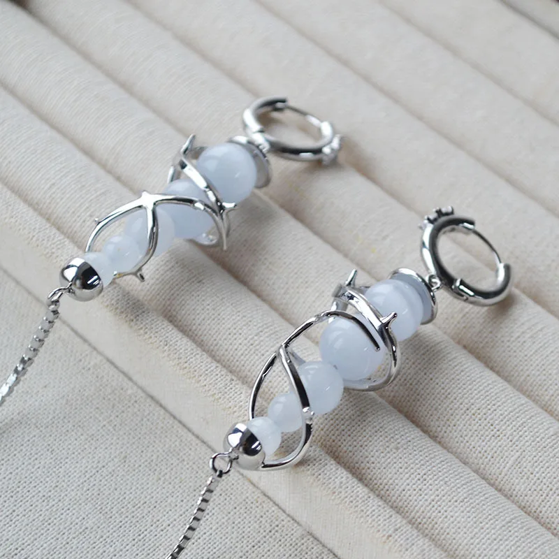 Star's Same Niche Design Cold Style Glass Cat Eye Spiral Thorn Zircon Flash Stone Little Circle Long Tassel Earrings for Women