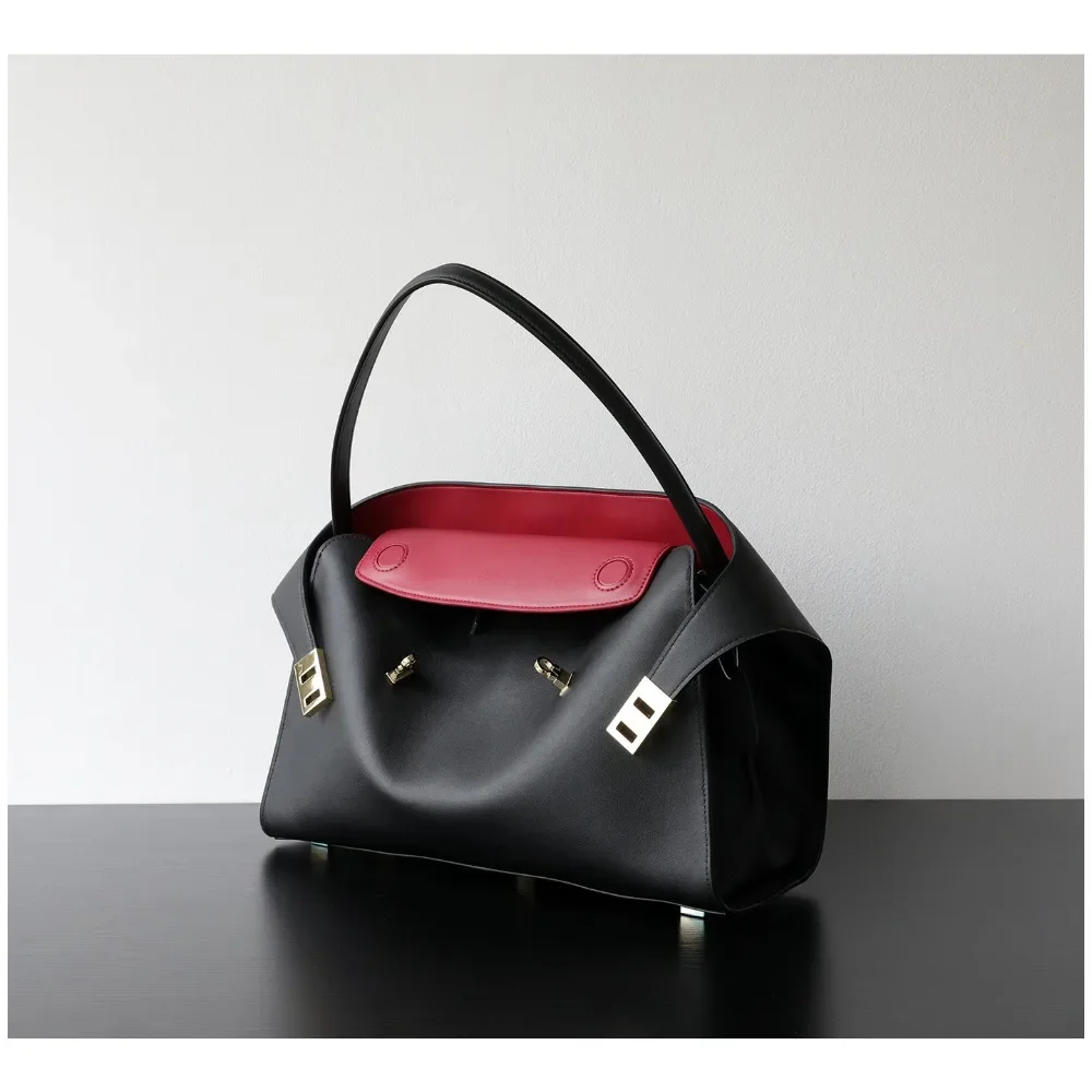 

Новая нишевая женская сумка-тоут из натуральной кожи высшего качества, большая вместительная сумка для повседневного использования и отдыха, универсальная.