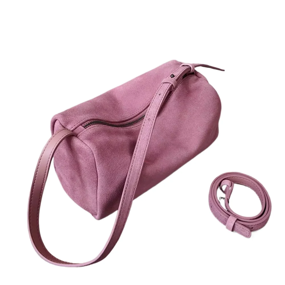 Nuevo bolso cruzado Ins Chic con forma cilíndrica para mujer, pequeño y atractivo bolso de hombro femenino de cuero de ante de vaca con capa superior rosa