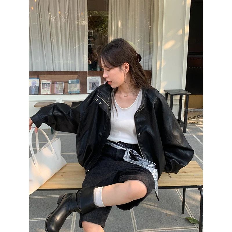 แจ็คเก็ตหนัง PU สีดำสำหรับผู้หญิง สไตล์สตรีทแวร์ คอตั้ง เสื้อคลุมมอเตอร์ไซค์ ฤดูใบไม้ร่วง สไตล์ฮาราจูกุ เกาหลี ซิป แขนยาว เสื้อคลุมตัวนอก ใหม่