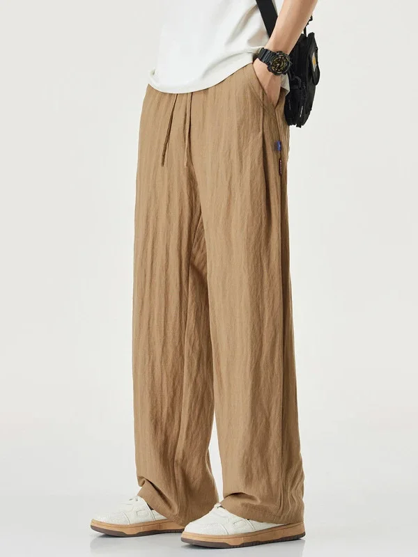 

Summer Thin Linen Breathable Loose Straight Leg Pants Men's Casual Wide Leg Trousers Comfortable Cool Sensation Casual Long T...