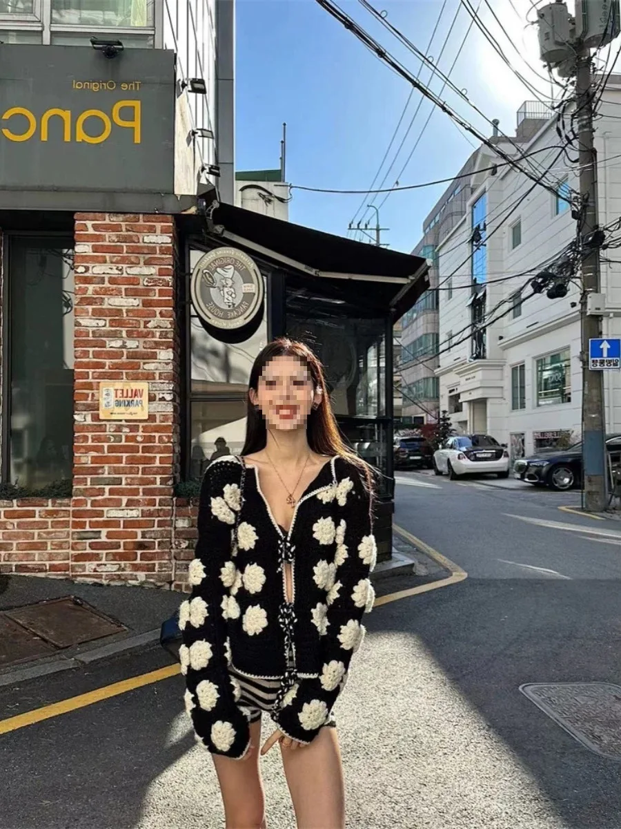 

Women's heavy industry wool lace-up hollow crochet knitted cardigan autumn and winterblack and white contrasting knitted sweater