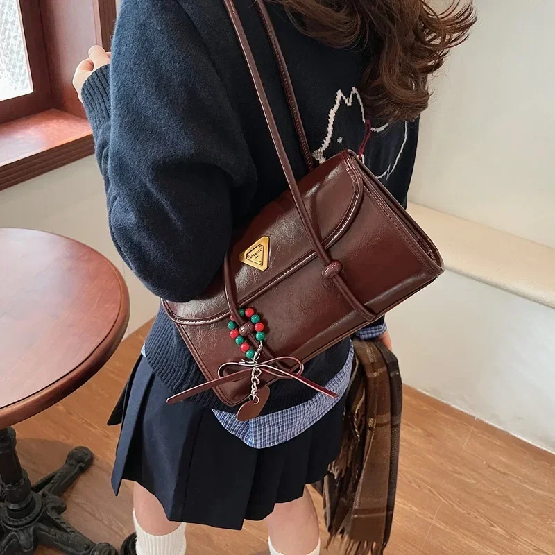 

Retro-Futurist Hobo 2025, RFID-Blocking Flap Bag with AR-Enhanced Monogram & Hidden AirTag Tunne