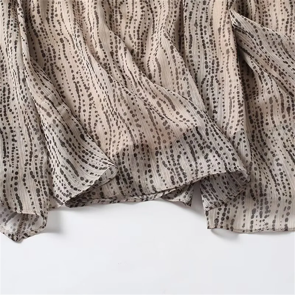 Herbst und Winter neue Damenbekleidung Französische Kunstserie Polka Dot Print Design Sinn unregelmäßiger Rock Rock