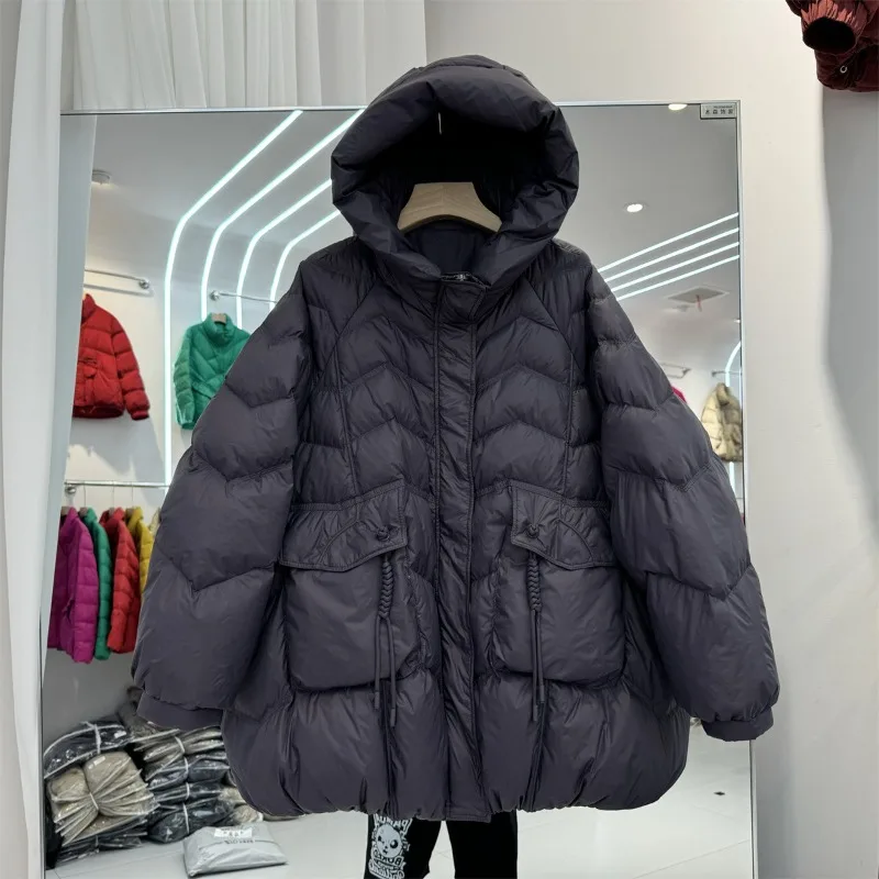 Hiver chaud nouveau à capuche en duvet de canard blanc ample vêtements d'extérieur matelassés poches manteaux vêtements pour femmes haut de gamme grande taille doudoune