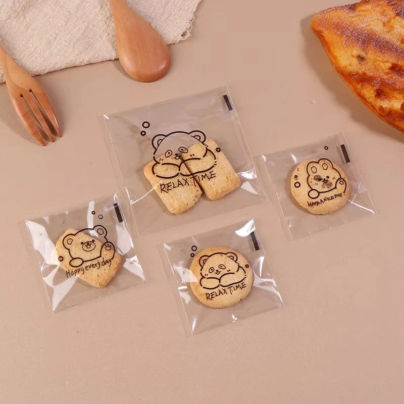 100 Stück transparente Brot-Geschenkverpackungen mit niedlichem Cartoon-Bärenmuster, selbstverschließende Beutel, quadratische Beutel mit Feiertagsgruß-Aufdruck – Detail 5