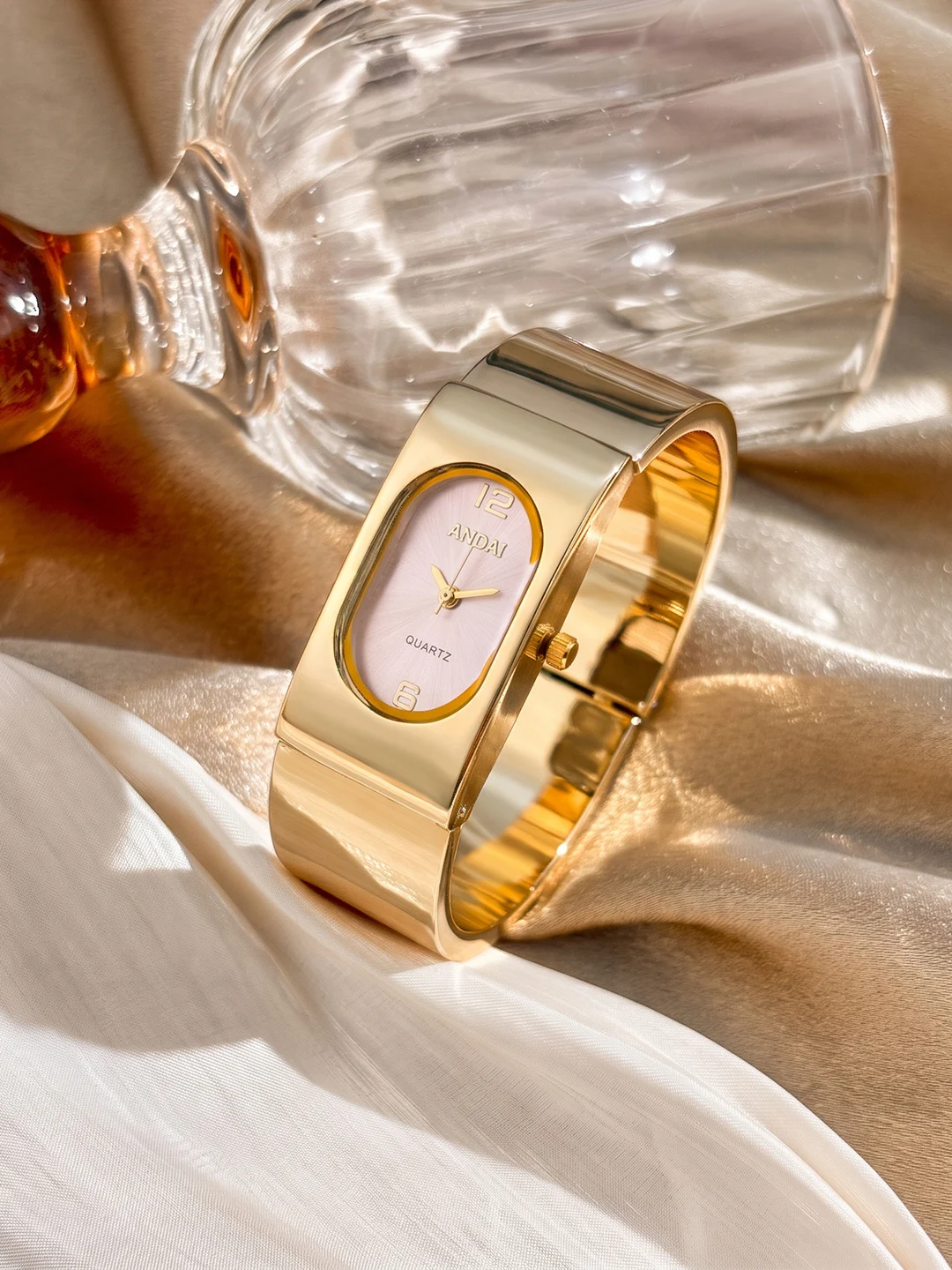 Exquisite Long Oval Dial One-Piece Bangle Analog Ladies Gold Wrist Watch