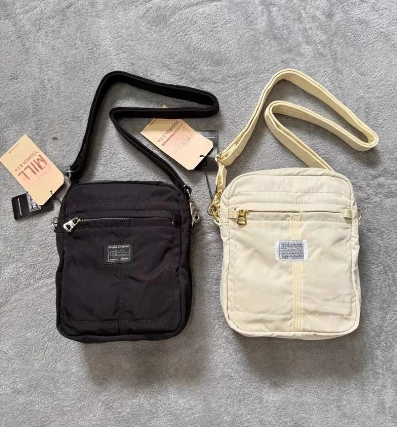 

Нейлоновая мини-сумка через плечо Por Mile с несколькими карманами