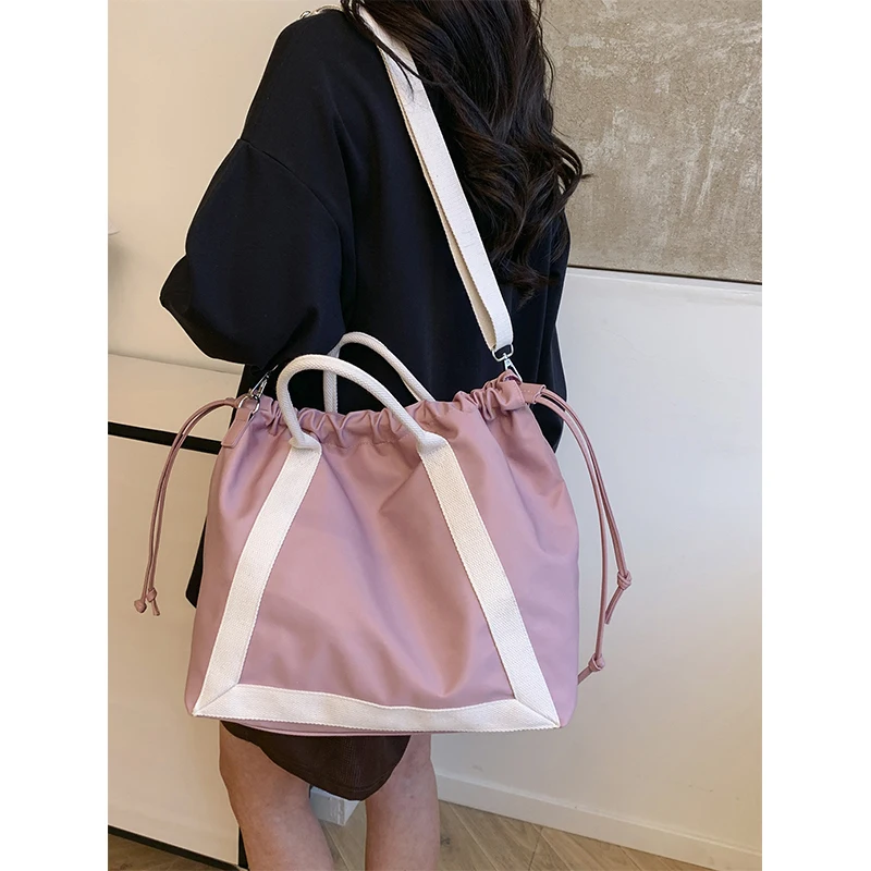 

New style drawstring handbag fashionable splicing drawstring gym bag women's large capacity versatile shoulder messenger bag