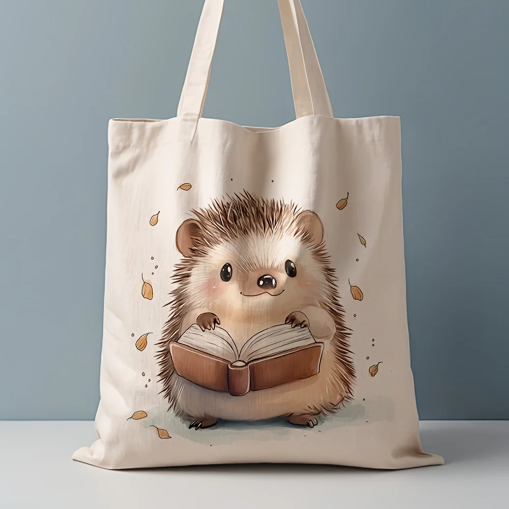 A Cute Hedgehog Reading Books pattern print canvas tote bag, suitable for daily use, shopping, school, and travel