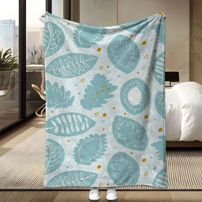 Turquoise and gold leaf patterned blanket, polyester fabric, machine washable, suitable for bedroom and living room.