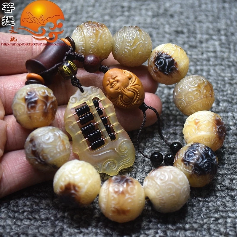 bead , horned Buddhist beads, ram's horn abacus, olive agate One Mind to Buddha bracelet