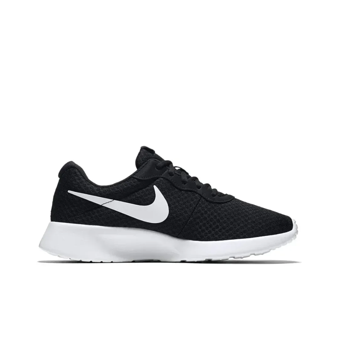 Nike Tanjun Comfortable and lightweight low top casual running shoes for men and women Black and white color scheme