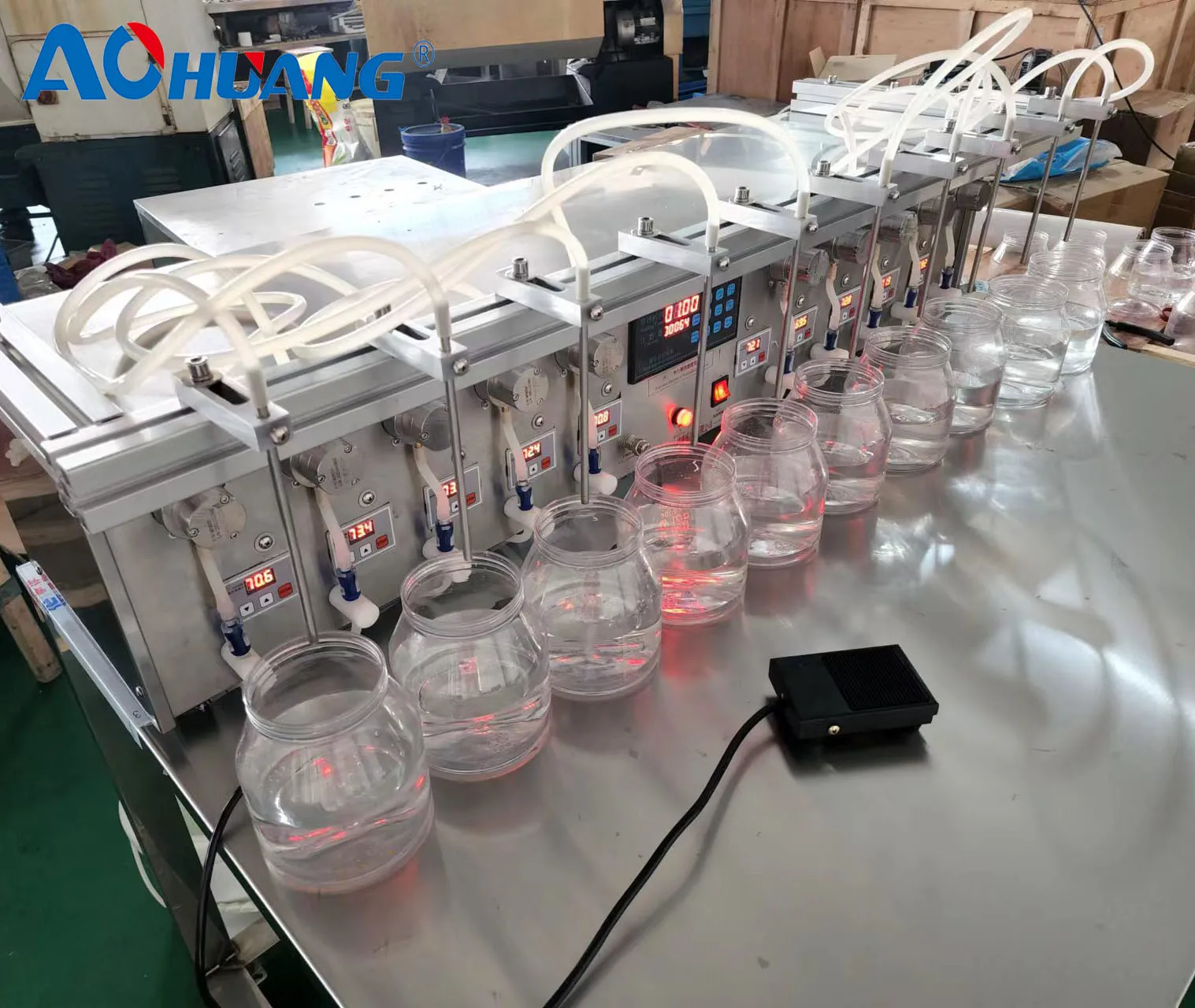 Máquina tampadora de enchimento automática de 4 cabeças Máquina de enchimento de líquidos para garrafa de suco de perfume de óleo essencial