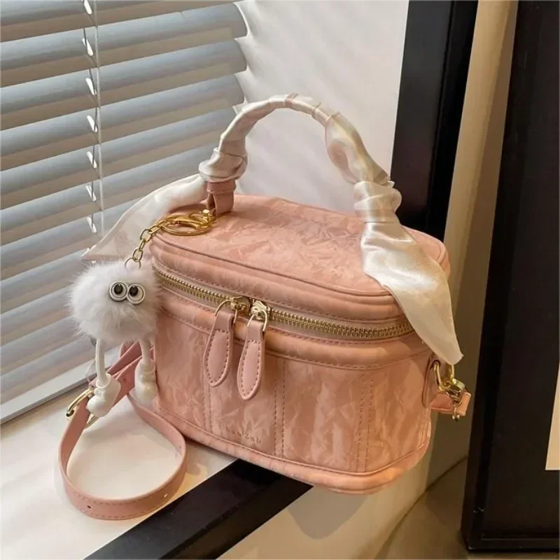Sac portable haut de gamme simple et polyvalent pour femme, nouveau design de niche, sac lancé, style coréen, printemps et été, E27