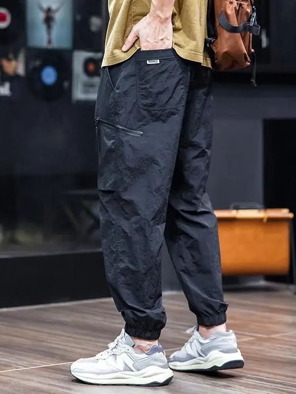 

Летние тонкие повседневные брюки мужские, модные, брендовые, быстросохнущие, спортивные, с манжетами, свободного кроя, больших размеров, рабочие, в стиле парашютиста, американские брюки-карго