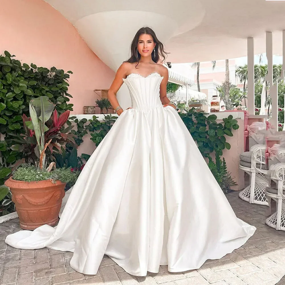 

2026 Modern Corset A-Line Wedding Dress Sweetheart Beaded Exposed Boning Bridal Gown with Pocket Pleat Satin for Engagement