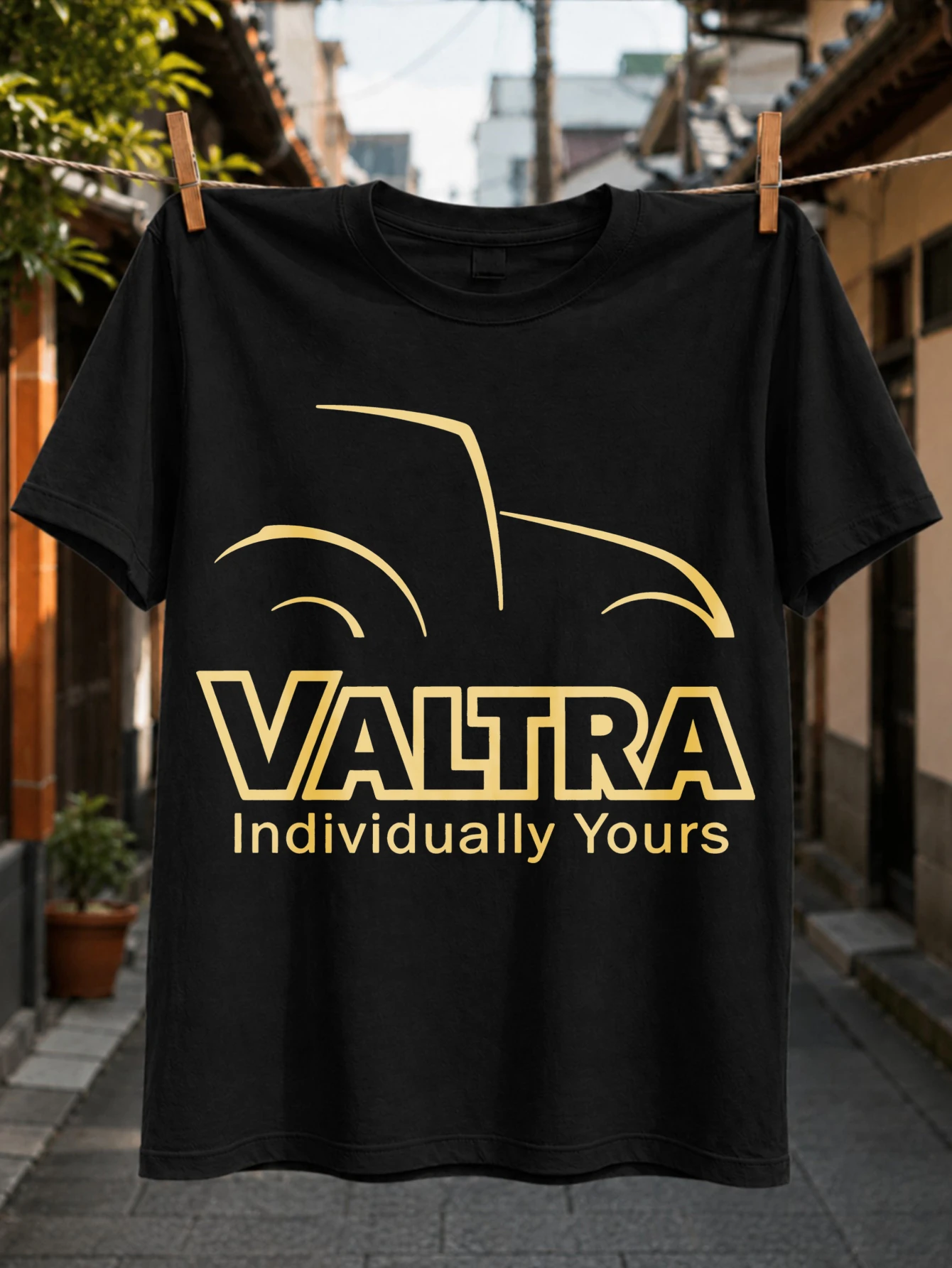 Valtra Individually Yours Tractor Logo gold line vehicle outline and bold agricultural fan text  Unisex All T-Shirt