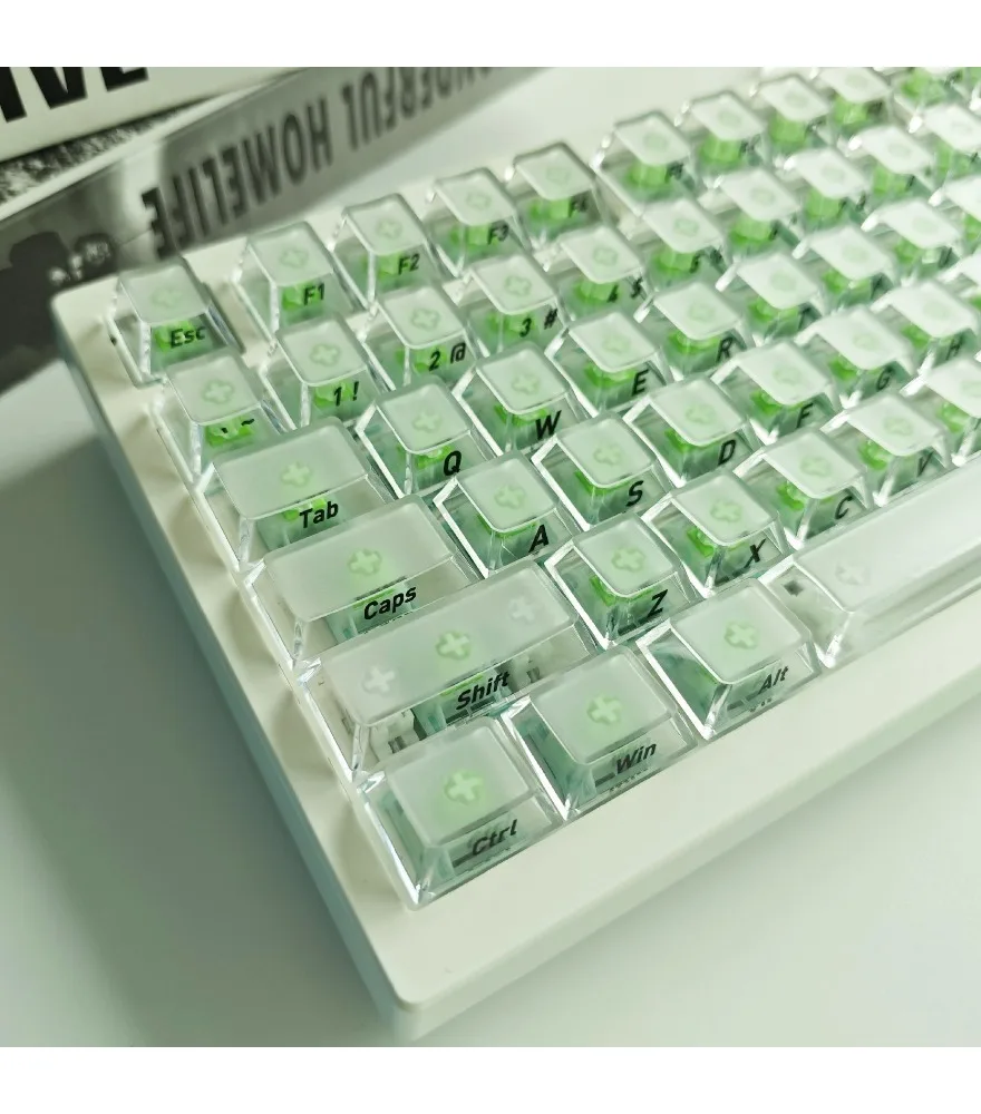 

Top surface matte four sides fog transparent white side engraved keycaps 118 keys small full set of two-color injection molding