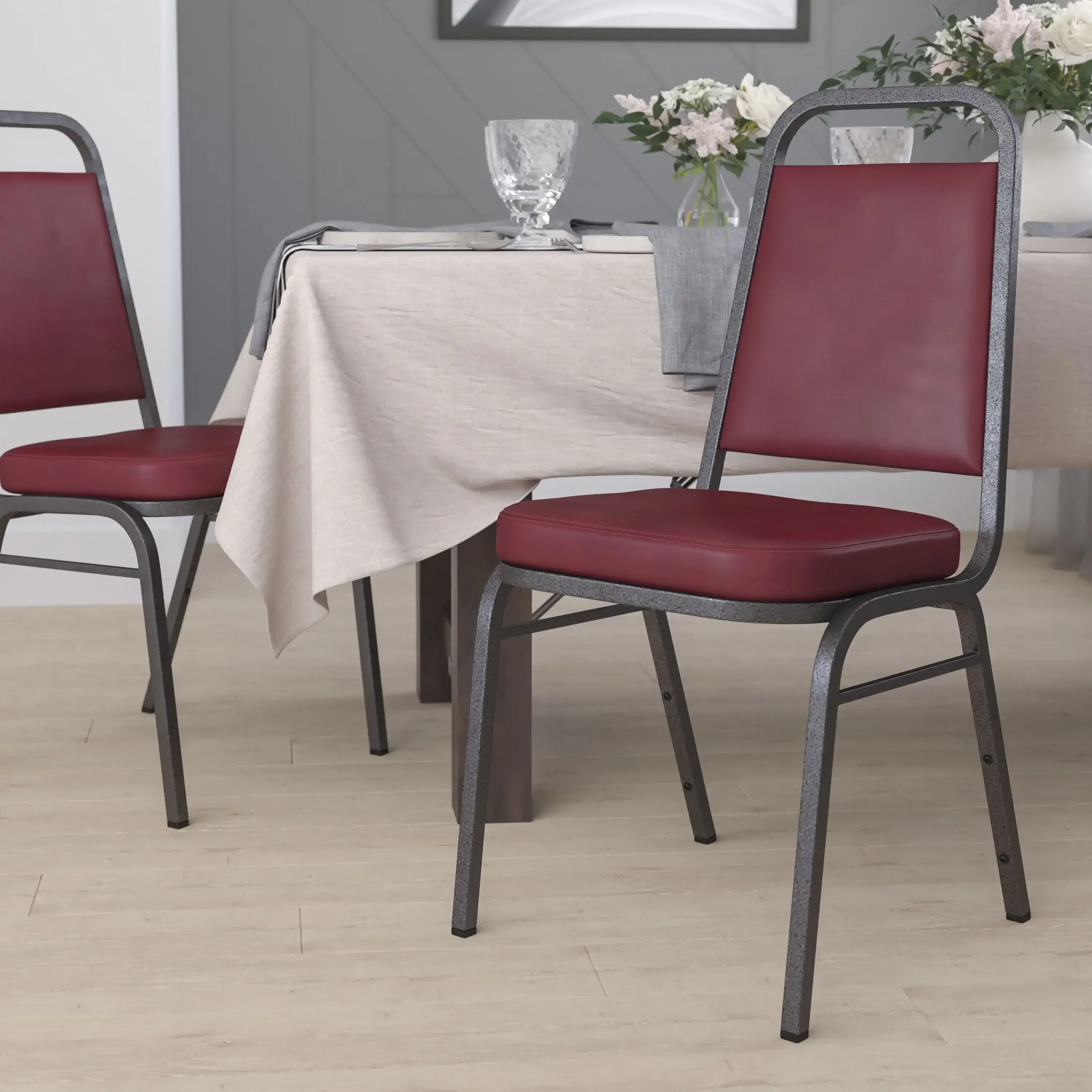 

HERCULES Series Trapezoidal Back Stacking Banquet Chair in Burgundy Vinyl - Silver Vein Frame Dinning Chair