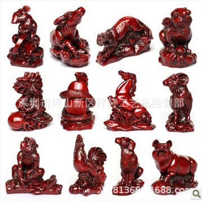 A set golden zodiac ornaments, including mice, cows, tigers, rabbits, dragons, snakes, horses, sheep, monkeys, chickens, dog