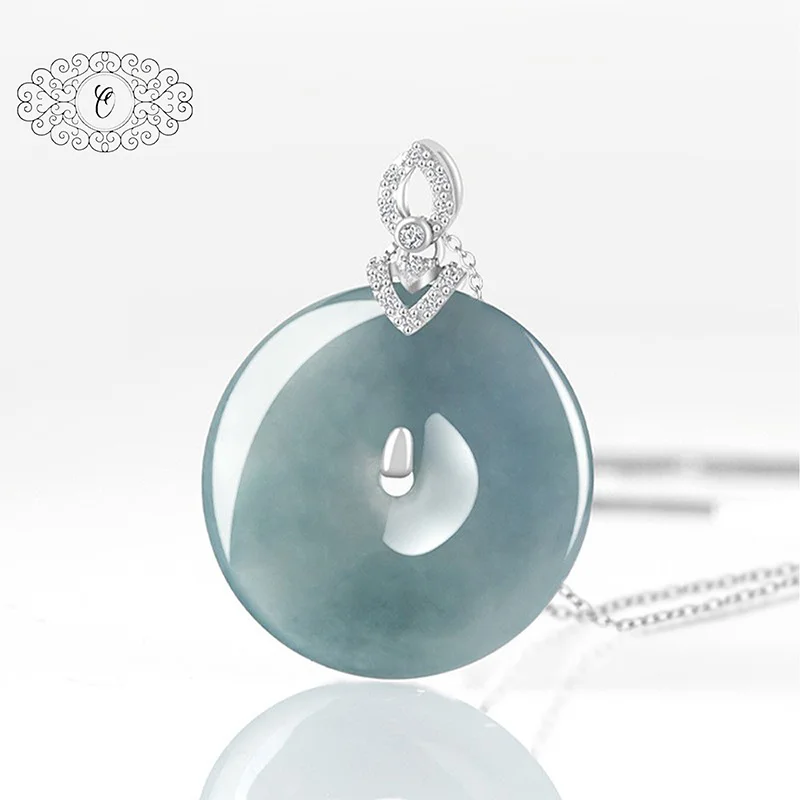 

Элегантный кулон-монета из сине-зеленого жадеита, с серебряной застежкой, инкрустированной цирконами, для вечной грации и защиты