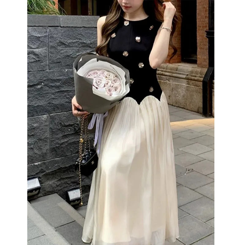 

2025 summer niche design three-dimensional floral splicing gauze dress dress with a thousand gold sleeveless vest dress gift dre