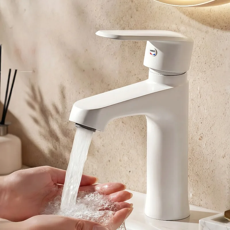 

New Luxury Solid Color Bathroom Sink Faucet,Copper Hot and Cold Water Mixing Faucet, Single-hole Bathroom Sink Faucet Kitchen