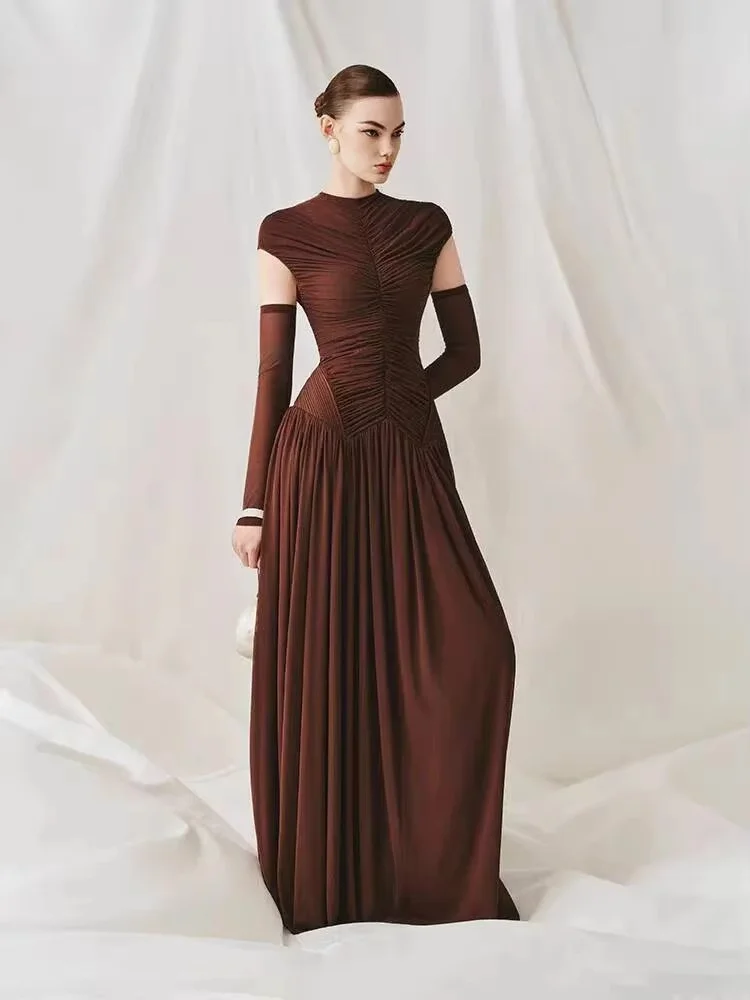 Stand collar cap sleeve pleated long gown matched with long gloves. Fitted waist with flowing pleated skirt. Custom sizes availa
