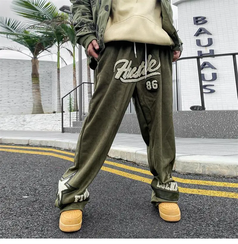 Straßen handtücher bestickt lose Sport hose koreanische Version trend ige Hip-Hop Retro Paar Freizeit hose Männer und Frauen