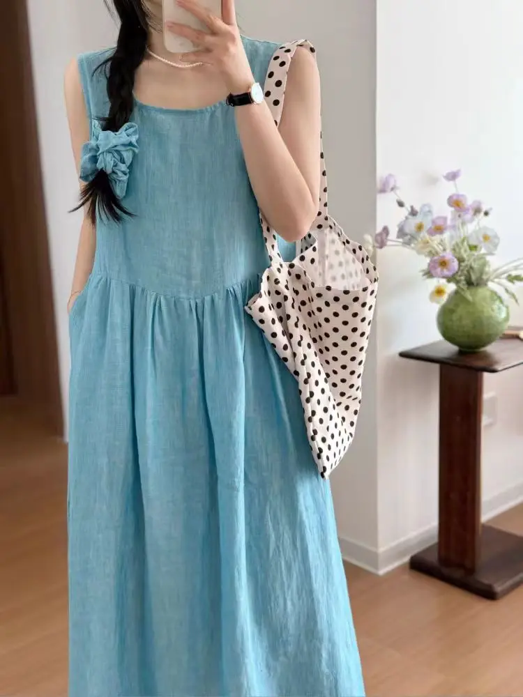 فستان صيفي كاجوال بدون أكمام من القطن والكتان للنساء، تنورة طويلة واسعة فضفاضة برقبة مستديرة وتصميم على شكل حرف A بلون موحد