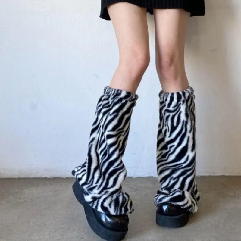 2025 Coprigambe maculato nuovo stile autunno e inverno alla moda Vendita calda Coprigambe per ragazza calda calda e spessa in peluche con personalità