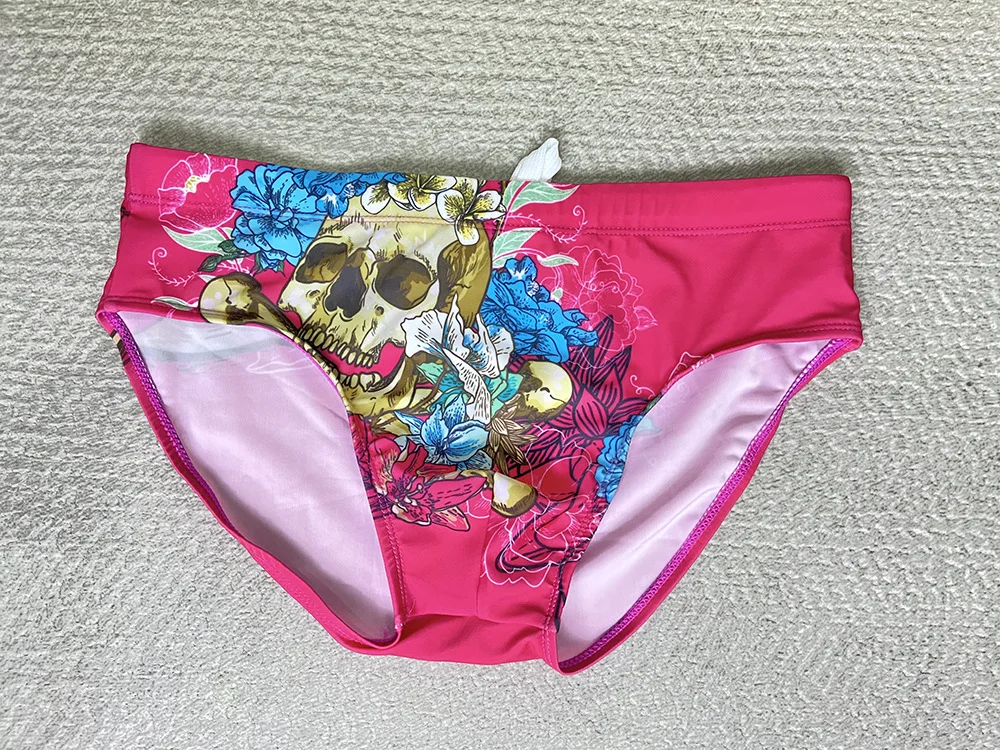 

Printed swimming trunks men's sports beach swimsuit punk personality European and American men's briefs 10003