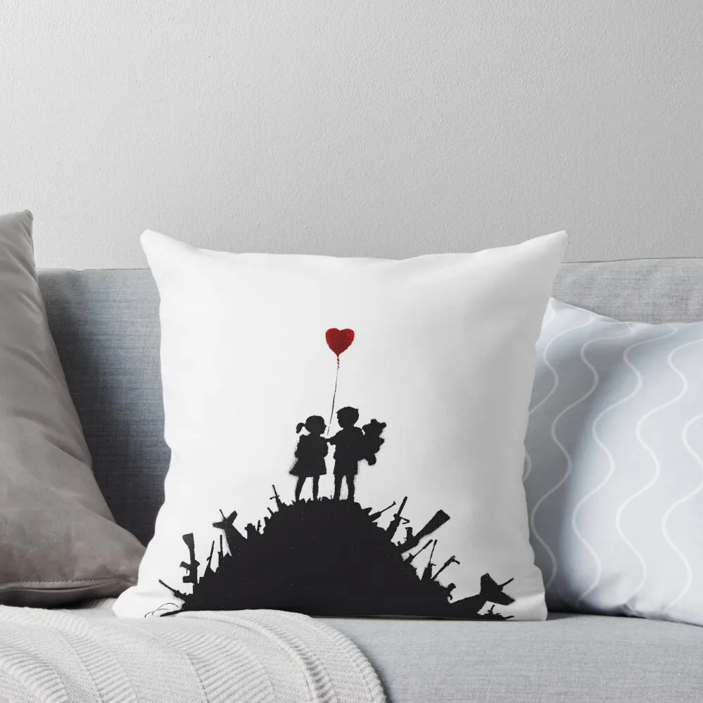 

Banksy graffiti children boy and girl with heart balloon on a pile of weapons Art for Kids, just a platform HD Throw Pillow