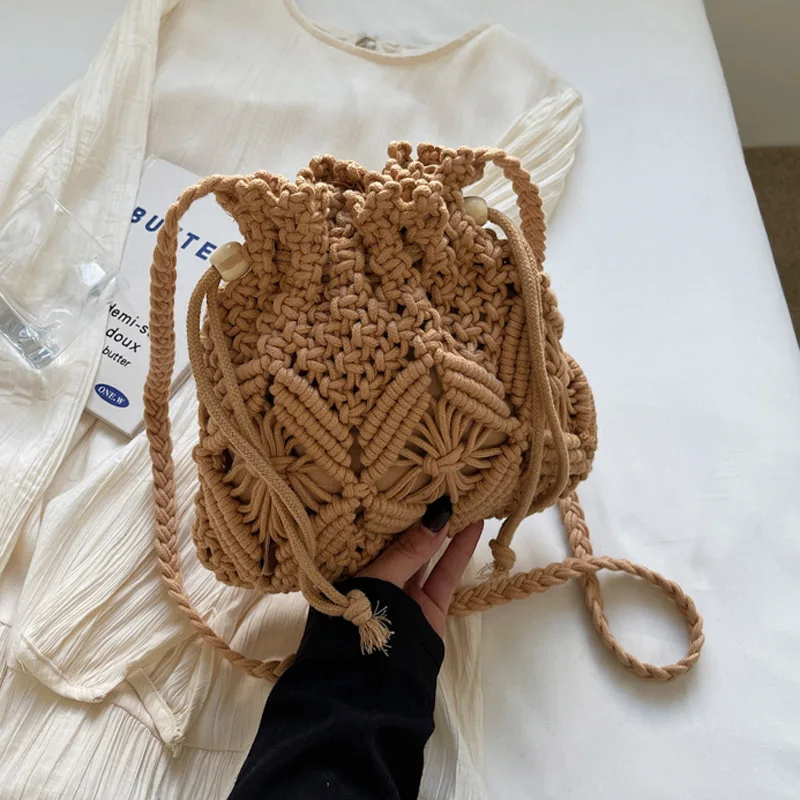 

Woven straw bag female summer Joker 2025 new fashion niche design slung bucket bag beach bag