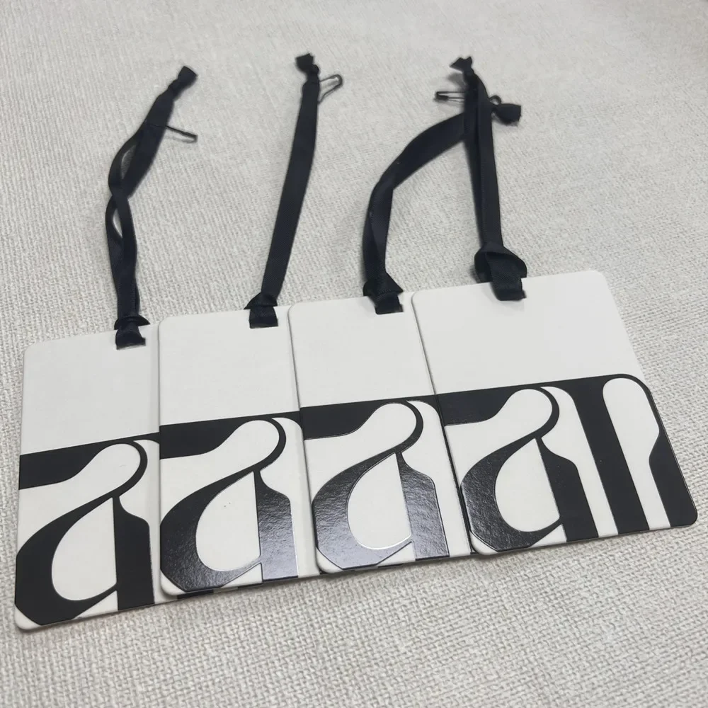 

Custom Embossed Logo Paper Hang Tags Wholesale, UV Printed Luxury Brand Labels, Multi-purpose Tags for Clothing Bags Shoes