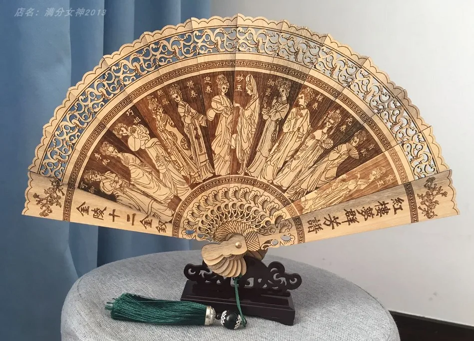 Golden silk nanmu fan hollowed out Chinese style retro carved folding fan, summer portable tabletop decoration craft decoration