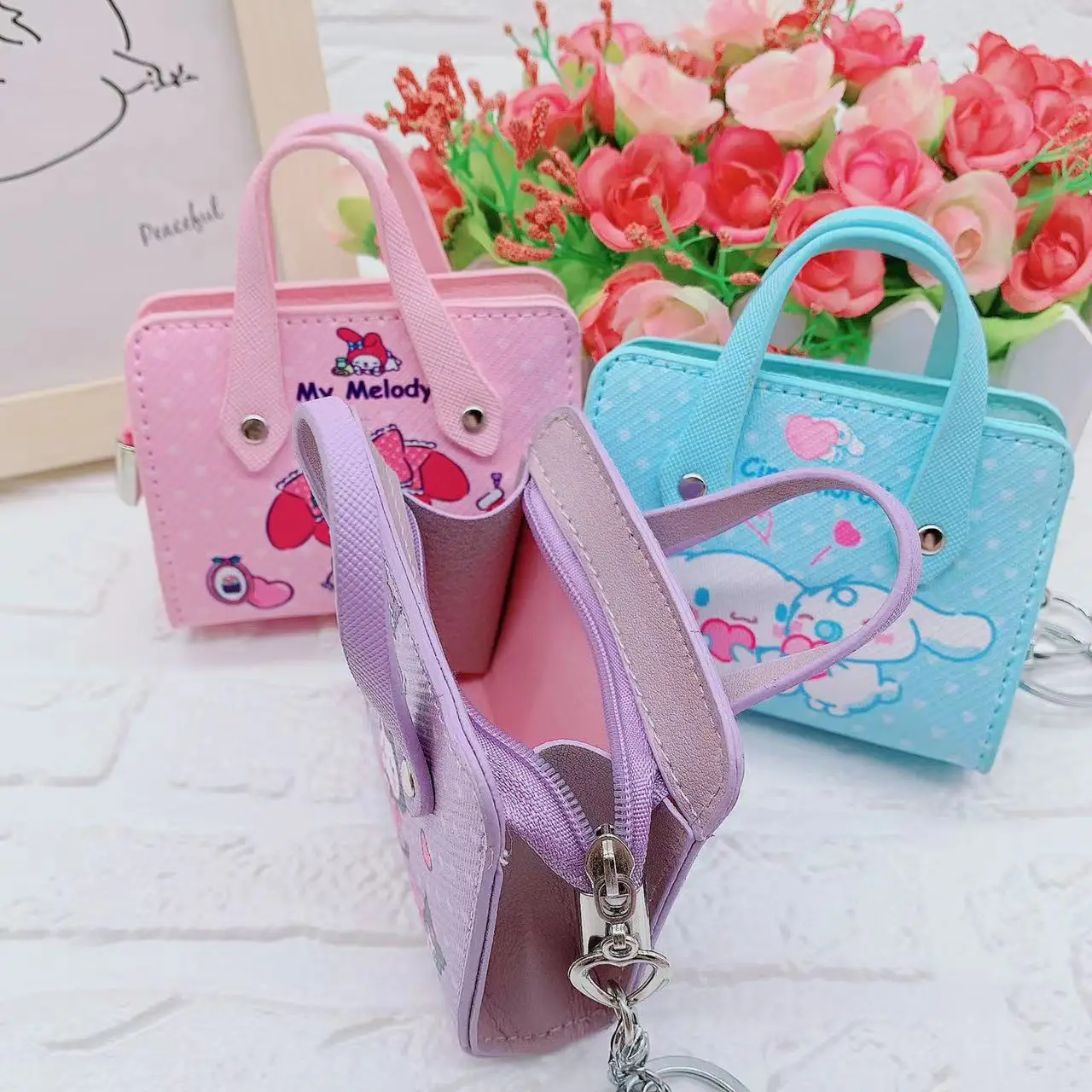 Sanrios Cinnamoroll Kuromi Mymelody kawaii Anime Cartoon PU Coin Purse key chain Mini Zipper Coin Storage Bag Organize Small Bag