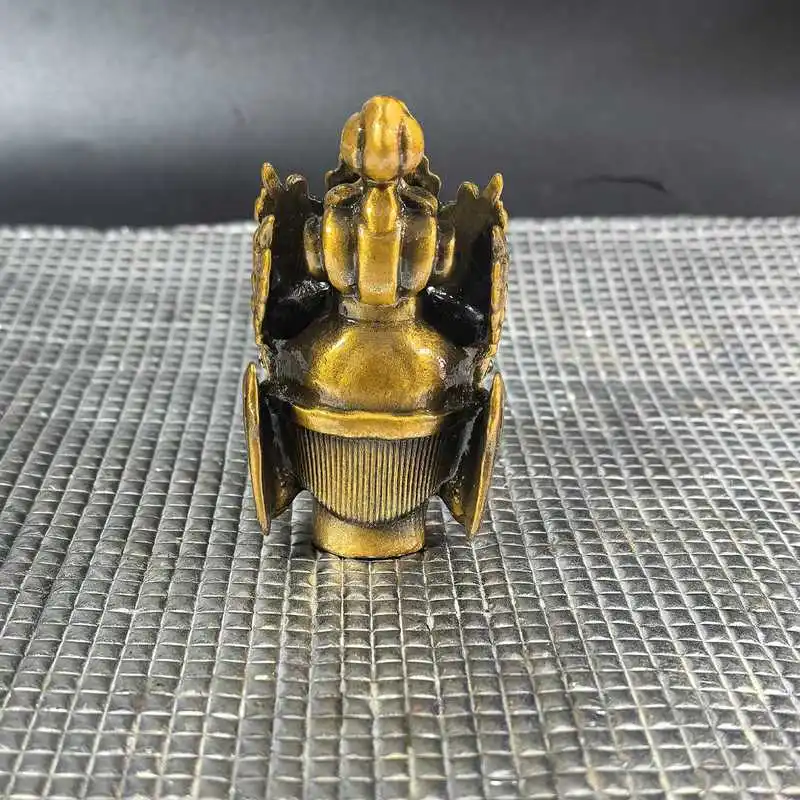 Antique-style, yellowed brass Guanyin head Buddha figurine, gilded, for display in a Buddhist hall, home, or living room