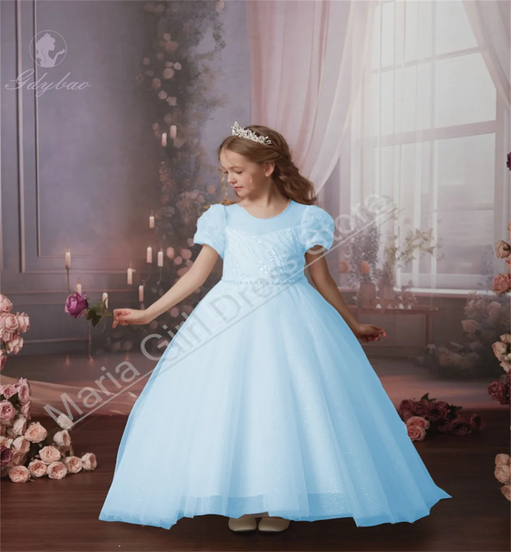 Eleganckie sukienki dla dziewczynek sypiących kwiatki, długie, prześwitujące, z okrągłym dekoltem, idealne na konkursy piękności, sakramenty, wesela i przyjęcia.