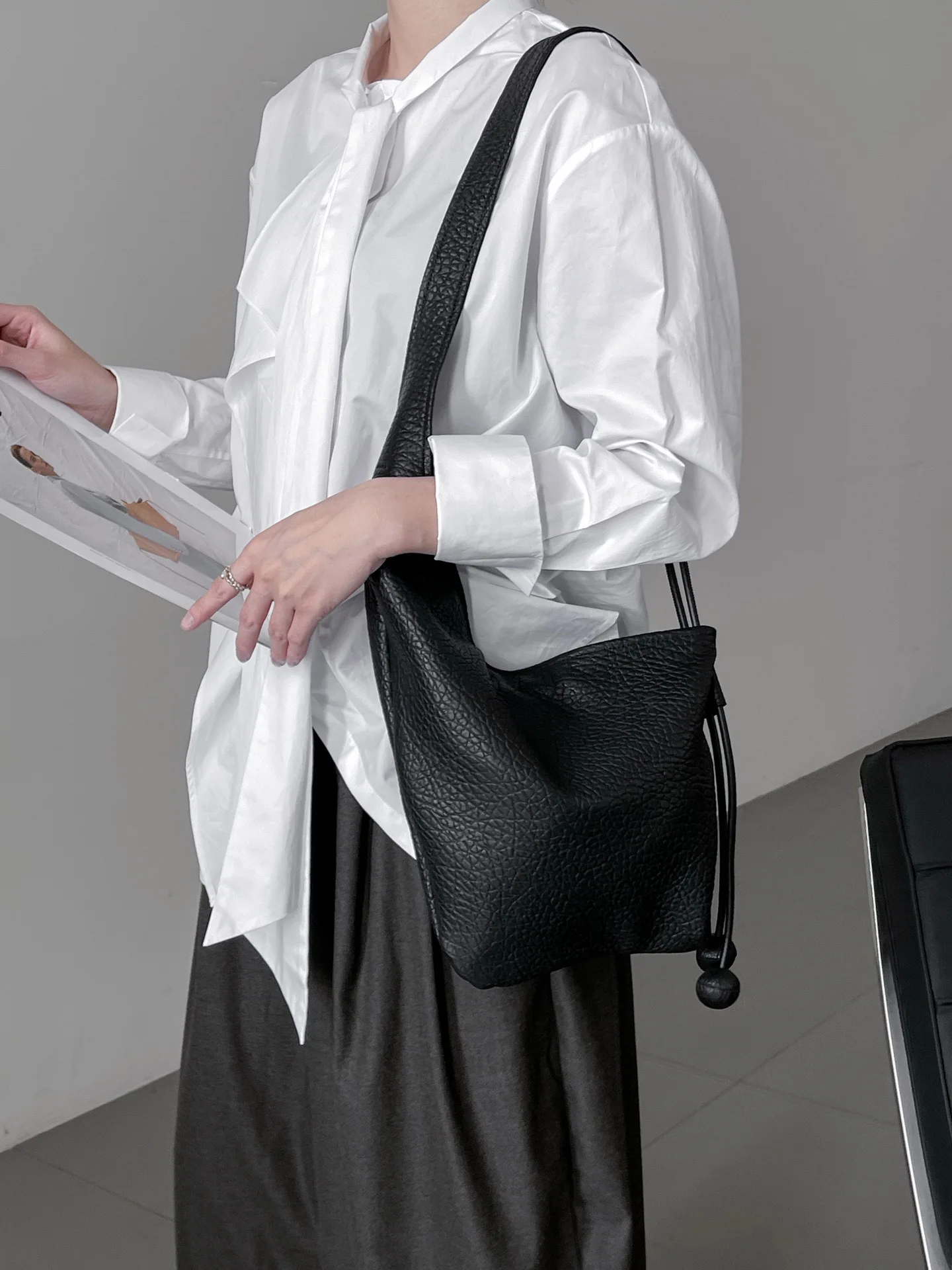 FIRMRANCH Fashion Special Bubble Texture Niche Design Soft Sheep Leather Ball Tassel Shoulder Crossbody Bag for Women Match-All