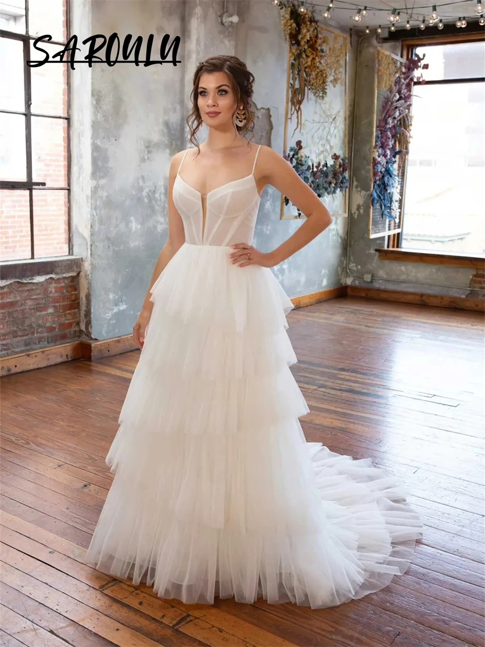 

Tiered A-line Tulle Wedding Dress With Spaghetti Straps Cleavage V Neck Modern Bride Dresses Backless Bridal Gown For Women