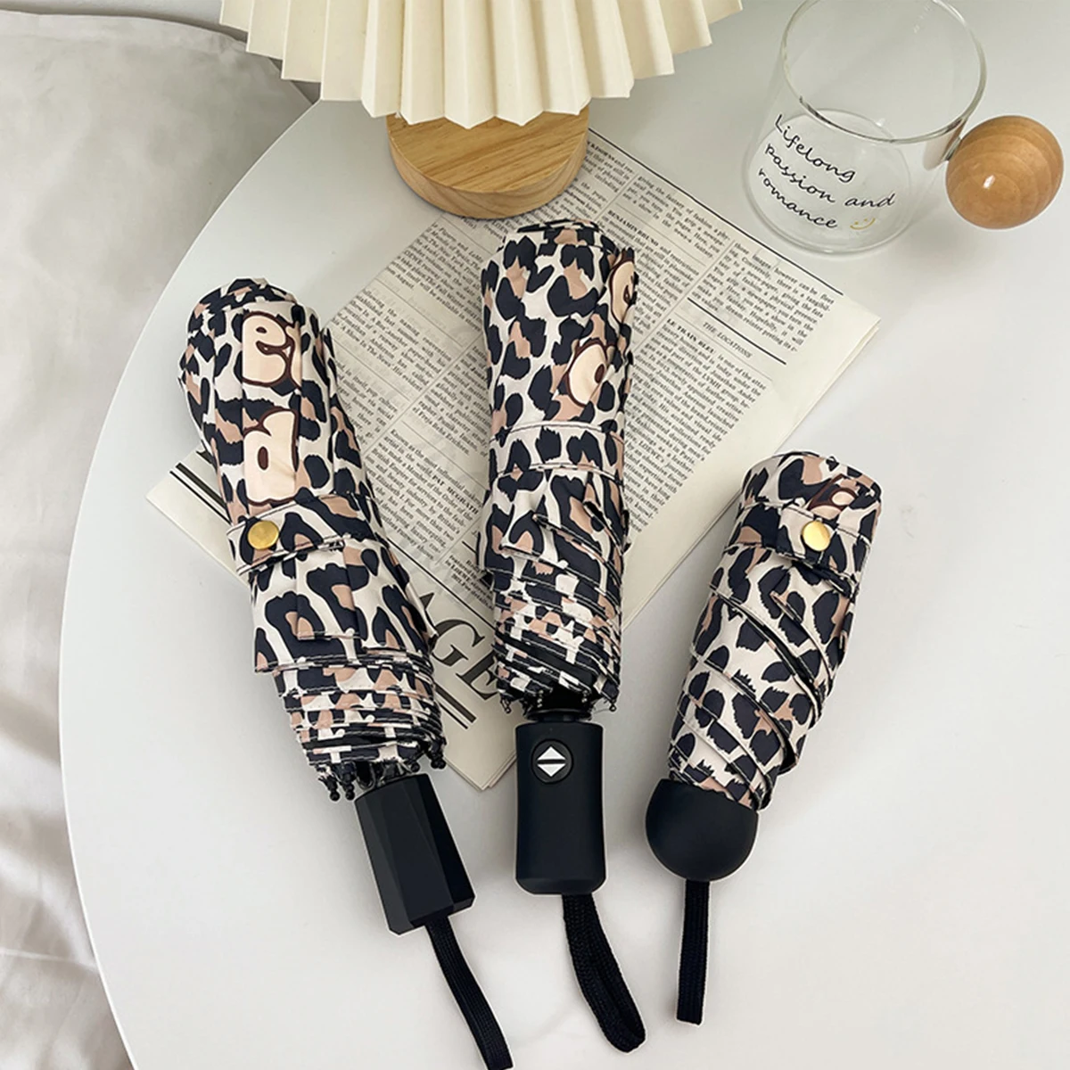 Leopard print retro three fold fully automatic black rubber rain and sun dual-use sun protection and UV protection umbrella