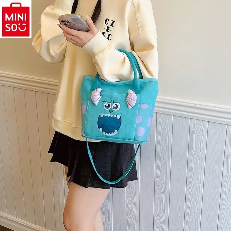 Miniso-Bolsa impressa de grande capacidade para estudantes, moda Disney, lona fofa, armazenamento doce e versátil, bolsa crossbody