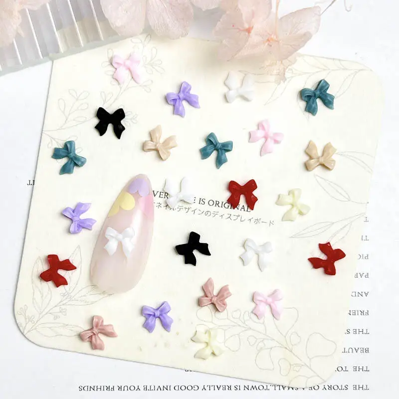 50Pcs 3D Resin Mini Solid Colors Bowknots Nail Art Decorations Minimalist Ribbon Bows Nail Charms Accessories DIY Nails Parts