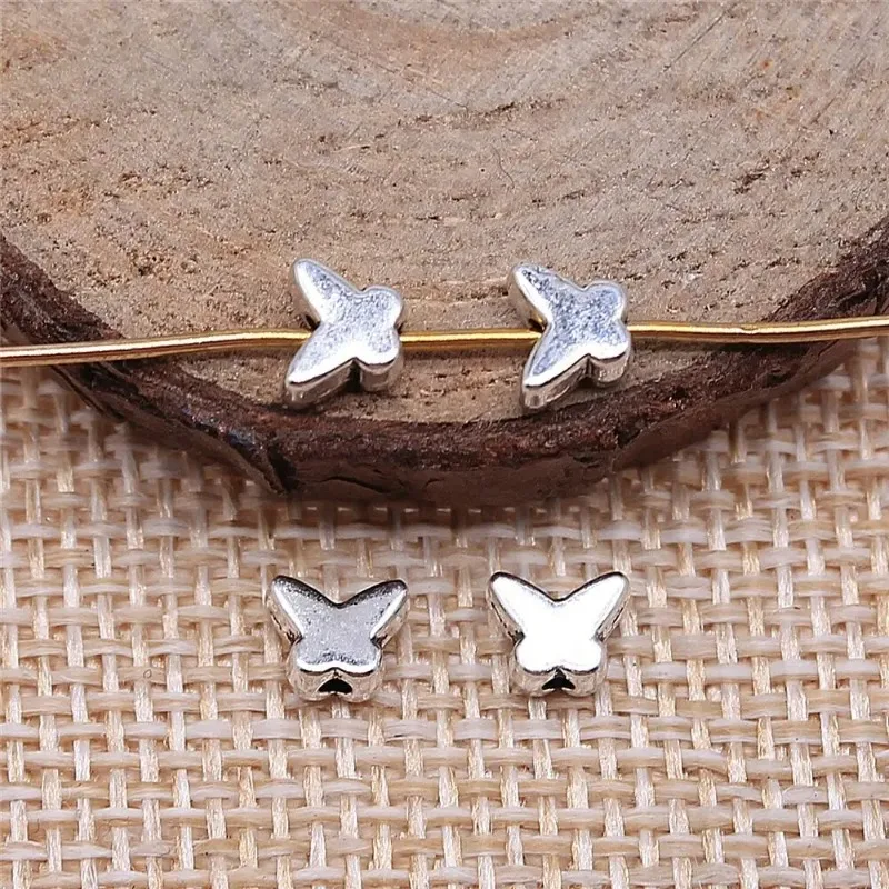 640 Stück antiksilberfarbene Schmetterlings-Abstandsperlen, 6 x 5 mm, lose Insektenperlen für Armbänder, Halsketten, Schmuckherstellung, Großhandel – Detail 2