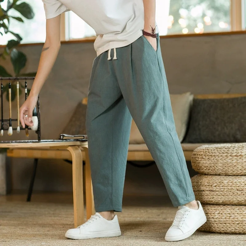 

Men's summer trendy casual loose straight-leg pants in solid color, breathable, suitable for shopping, with drawstring pockets.